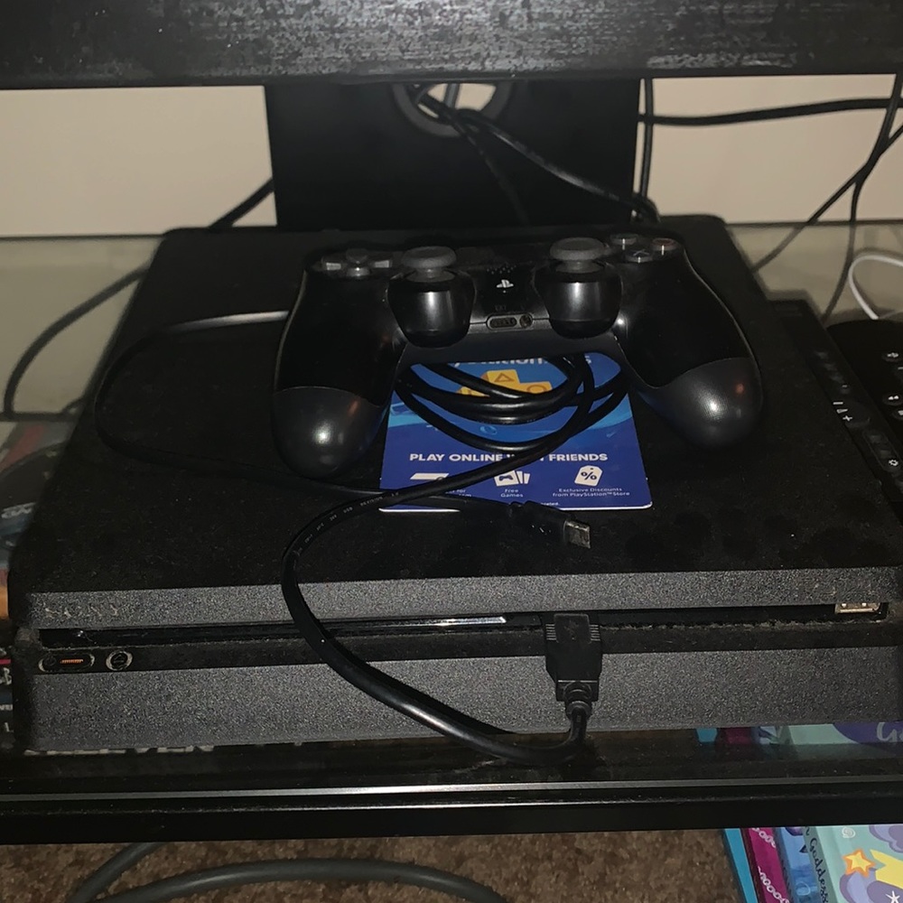 Play station 4 with games and 3 month play station plus